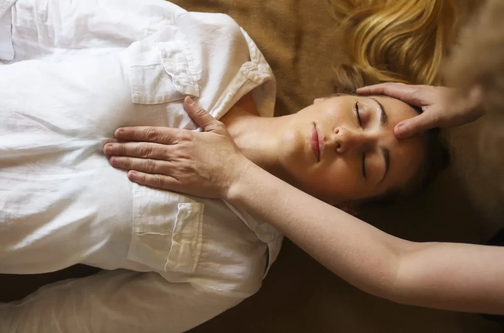 A woman getting her body to heal in a psychic.